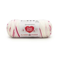 red heart flower power yarn in white and pink, with the words'red heart'on