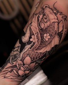 a person with a tattoo on their arm