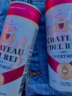 two cans of chateau del riel next to each other in someone's jeans pocket