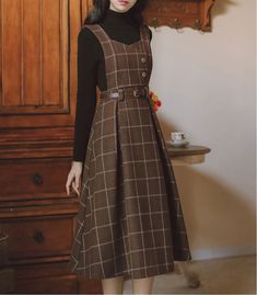 This stunning wool Dark Academia Pinafore Dress with belt is the perfect addition to your winter academia wardrobe! *a sleeveless pinafore dress, top is not included Size S Bust 84cm Waist 66cm Length 103cm Size M Bust 88cm Waist 70cm Length 104cm Size L Bust 92cm Waist 74cm Length 105cm Size XL Bust 96cm Waist 78cm Length 106cm Winter Brown Belted Dress, Winter Workwear Dress With Belt, Sleeveless Wool Dress For Fall, Sleeveless Wool Dresses For Work, Fall Sleeveless Pinafore Dress For Workwear, Fall Midi Length Sleeveless Dress For Work, Vintage Sleeveless Pinafore Dress For Fall, Dark Academia Pinafore, Academia Wardrobe