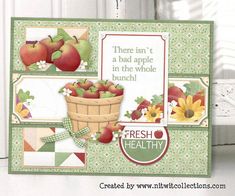 there is a card with apples and flowers on it