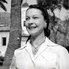 black and white photograph of a woman smiling