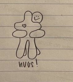 a drawing of a teddy bear with the word hug on it's chest, in front of lined paper