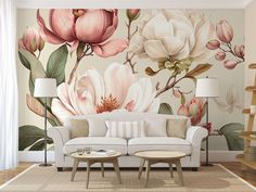 a living room with flowers painted on the wall