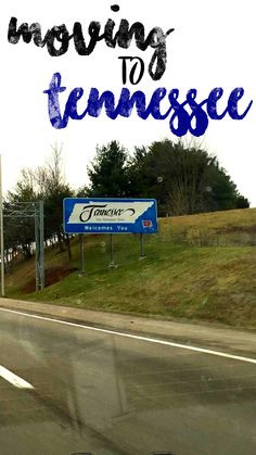 there is a blue sign that says moving to tennessee on the side of the road