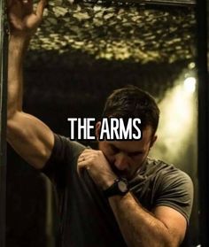 a man holding his arm up with the words, the arms in front of him