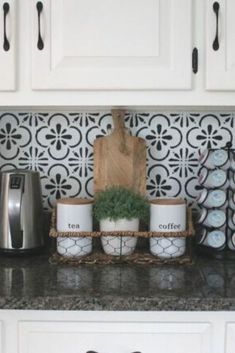 the kitchen counter is clean and ready to be used for breakfast or desserts, as well as coffee mugs