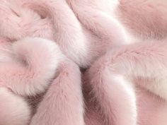 the fur is pink and white in color