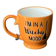 i'm in a witchy mood coffee mug with black writing on the side