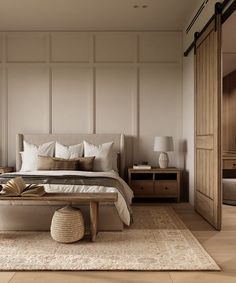 a bedroom with a large bed and wooden furniture