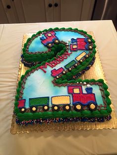 a birthday cake with a train on it