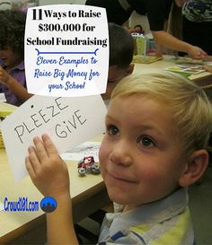 a young boy holding up a piece of paper with the words prize give written on it