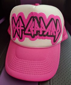 Def Leppard pink mesh trucker hat. Pink & black puff vinyl. Pink Mesh Baseball Cap, Spring Hip Hop Trucker Hat For Streetwear, Pink Snapback Trucker Hat, Pink Flat Brim Trucker Hat, Pink Curved Bill Snapback Hat For Spring, Trendy Pink Snapback Baseball Cap, Spring Pink Snapback Hat With Curved Bill, Pink Mesh Hat With Curved Brim, Pink Mesh Hat For Spring