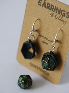 Inject a hint of whimsical charm into your style while ensuring you never misplace your dice again! Introducing our exclusive 3D printed earrings designed to effortlessly click in a d20 dice, effortlessly transitioning from casual wear to game night. 👉Prefer a regular size d20? The regular d20 earrings of holding is available in our shop! 💜 The ear-hooks are hypoallergenic silver  Our earring dice holder boasts simplicity, allowing your dice to shine and serve as a conversation starter! 😉 The Dnd Themed Gifts, D&d Accessories, D20 Earrings, Dice Holder, Dnd Gifts, Aries Aesthetic, Dnd Gift, 3d Printed Earrings, Printed Earrings