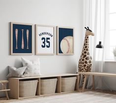 a child's room with posters and toys on the wall, including a giraffe