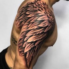 a man's half sleeve with an eagle tattoo on his left arm and chest