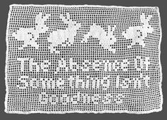 an old crocheted doily with white flowers and words written in cursive writing