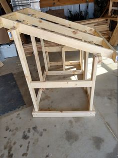 a wooden structure being built in a garage