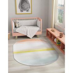 a child's room with a teddy bear in the crib and a rug on the floor