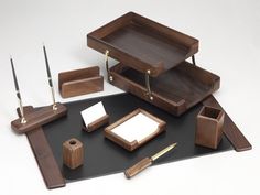 an assortment of wooden items on a black tray