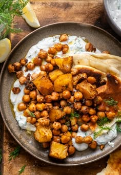 a plate filled with potatoes and chickpeas