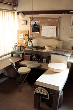 an old fashioned kitchen with lots of counter space