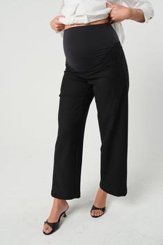 Luxury and comfort meet in our Nathalie Wide Leg Maternity Trouser. Cut with sustainable Italian stretch suiting fabric, this stylish work and occasion pant features deep slash front pockets, a tailored silhouette, and a supportive belly band for comfort throughout pregnancy. Sustainable fabric Wash at home Supportive belly band 4 functional pockets Maternity Trousers, Workwear Essentials, Maternity Nursing Dress, Suiting Fabric, Sustainable Fabric, Nursing Tops, Nursing Dress, Belly Band, Maternity Shops