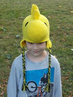 This hat is inspired by Woodstock. I make a Snoopy inspired hat and had quite a few customers request Woodstock inspired hat as well. The hat Whimsical Adjustable Crochet Cap Hat, Whimsical Adjustable Crochet Cap, Adjustable Whimsical Crochet Cap, Playful Yellow Beanie Hat, Playful Adjustable Brimmed Costume Hats, Playful Adjustable Brimmed Costume Hats And Headpieces, Fitted Brimmed Fun Hat, Yellow Adjustable Crochet Cap, Fun Fitted Brimmed Hat