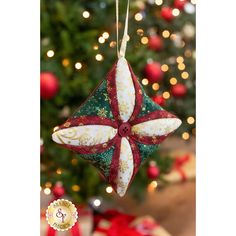 a christmas ornament hanging from a tree