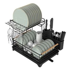 the dish rack is full of dishes and utensils