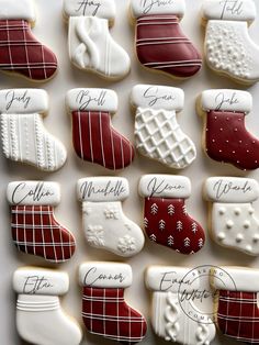 christmas cookies decorated with white and red stocking designs