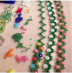 beaded bracelets are arranged on a table