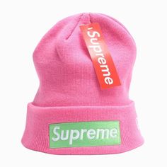 Pink Supreme Beanie New Era, featuring a vibrant pink hue and a striking green embroidered Supreme logo. Elevate your streetwear game with this iconic accessory. Crafted with quality and style in mind, this beanie is a must-have for fashion-forward individuals. Grab yours now! Fabric: 100% cotton One size fit all. Mea Culpa Beanie Pink, Cotton Beanie With Logo Patch, Streetwear Beanie With Letter Print, Trendy Letter Print Beanie, Hip Hop Beanie For Winter Streetwear, Hip Hop Beanie For Streetwear In Winter, Casual Beanie With Letter Print, Casual Beanie With Embroidered Logo For Winter, Casual Embroidered Logo Beanie For Winter