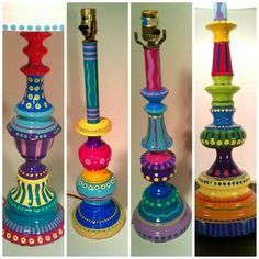 three different types of colorful candlesticks with dots and circles on them, all in different colors