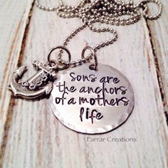 a necklace that says, sons are the anchors of a mother's life on it