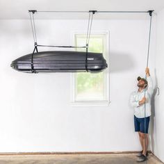 cargo box ceiling storage pulley Garage Wall Storage The Home Depot, Kayak Storage Garage, Bike Storage Rack, Overhead Garage Storage, Overhead Garage, Kayak Storage, Pulley System, Ceiling Storage, Boat Storage