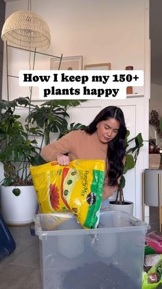 a woman holding a bag of plants in her hands with the caption how i keep my 150 + plants happy