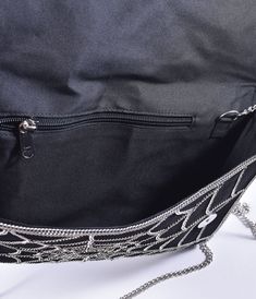 This enchanting accessory features intricate spider web embroidery that adds a playful touch to any outfit. With a fold over magnetic snap closure, you can keep your essentials secure while looking fabulous. The inner zipper pocket is perfect for stashing small treasures, and the removable chain strap offers versatility for day or night adventures.This is a Special Order item, please allow a 3 day handling time.Available while supplies last. Spider Handbag, Spider Web Embroidery, Web Embroidery, Handbags Unique, Unique Handbags, Embroidered Clutch, Vintage Purses, Retro Clothing, Envelope Clutch