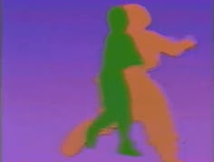 a blurry image of two people running in the air with their arms around each other