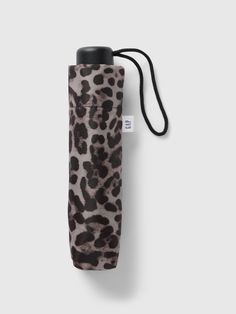 Smooth, water-resistant umbrella.  Wrist strap at push-button handle.  Hook and loop wrap-strap closure.  Allover leopard print. Leopard Print Things, Uni Essentials, Gift Inspo, Wrist Strap, Christmas Wishes, Toddler Gifts, Accessories Shop, Things To Buy, Leopard Print