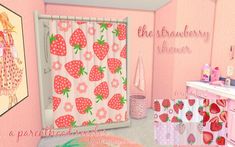 a pink bathroom with strawberry themed shower curtain