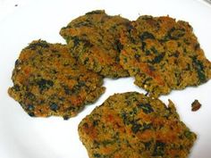 four pieces of vegetable patties on a white plate