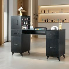 a black desk with drawers and bottles on the shelves in front of it is shown