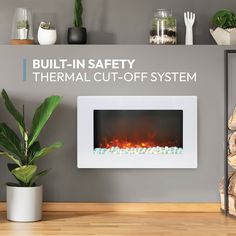 an electric fireplace with the words built in safety thermal cut - off system