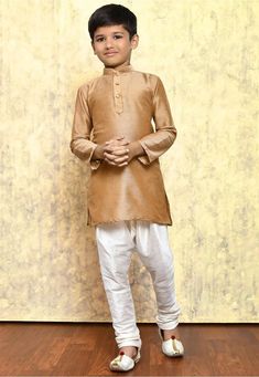 This exquisite Kids Kurta Set is specially crafted for Birthdays , Indian weddings and festivals. The set includes a beautifully self-embroidered Dopion art silk top, paired with your choice of a ready-made Dhoti, Chudidar or Patiyala bottom. Attributes 1. Top - Premium Quality Cotton Silk Fabric 2. Bottom - Ready Made Chudidar/ Doti/Patiyala 3.  Color -Pistachio ,Fawn,White, Light Beige,Green Note For Perfect Fitting * Pls Check the kid's Body Chest Exact Measurement With Out Adding Any Space or Gap From Your Side Kids Kurta Pajama, Ring Bearer Suit, Kids Kurta, Wedding Dresses For Kids, Cotton Silk Fabric, Boys Kurta, Kids Rings, Boys Suits, Boys Pajamas