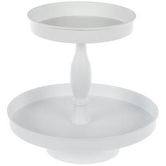 two tiered cake stand with white frosting