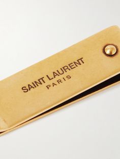 Cash isn't dead just yet and for good reason— a money-clip is a sharp addition to an outfit. SAINT LAURENT's is made from gold-tone metal that's inscribed with its decal. Match it to your cufflinks. Money Meme, Mens Money Clip, Saint Laurent Collection, Money Clips For Men, Mens Money Clip Wallet, Business Ideas For Beginners, Saint Laurent Wallet, Italian Luxury Brands, How To Get Clients