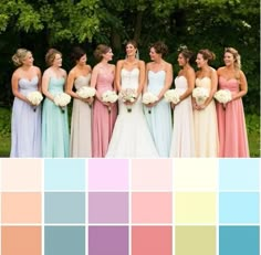 a group of women standing next to each other in front of trees with color swatches