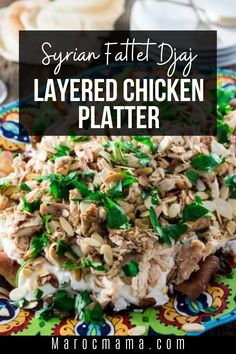 layered chicken platter on a colorful plate with text overlay