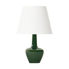 a green table lamp with a white shade on the base and a light in the middle